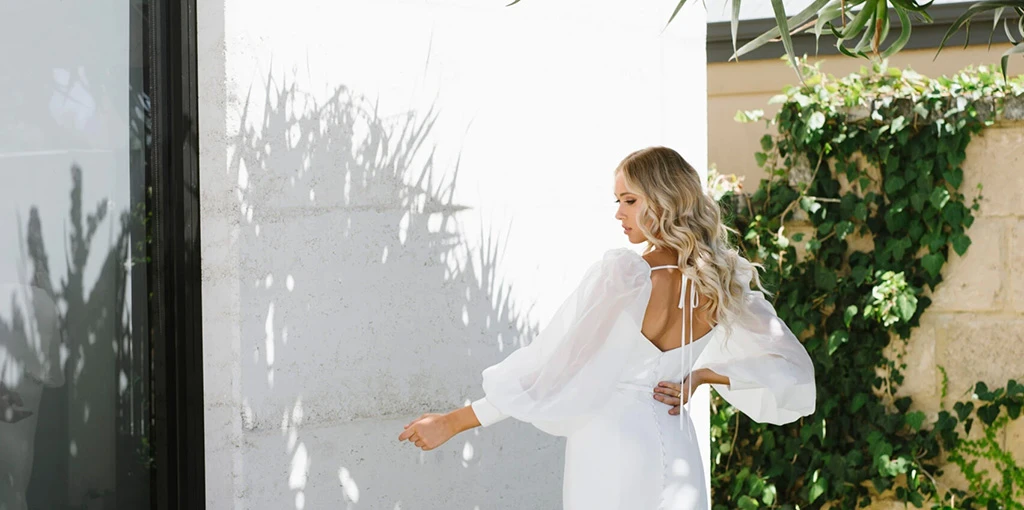 Back of Bride wearing a simple long sleeve